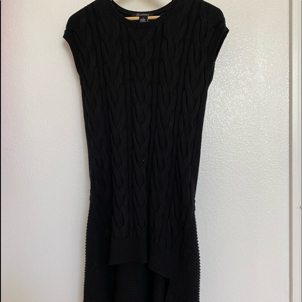 Black no sleeve sweater dress.